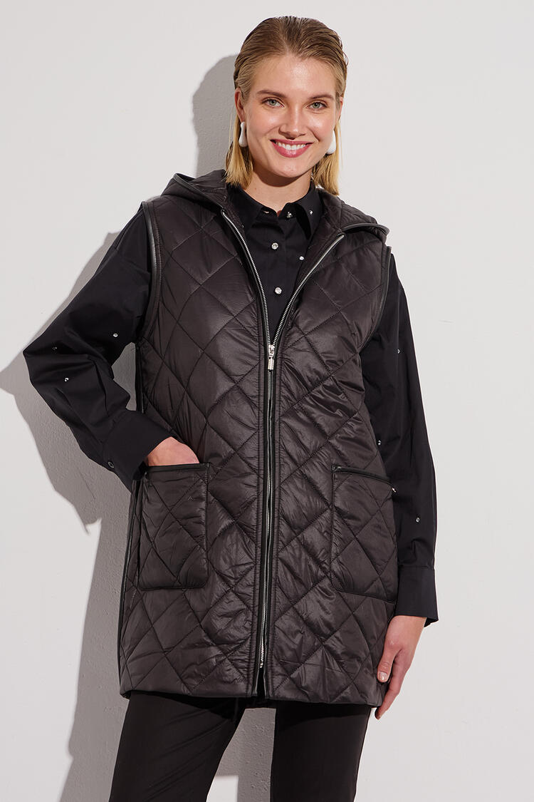 Quilted vest with hood - Black S